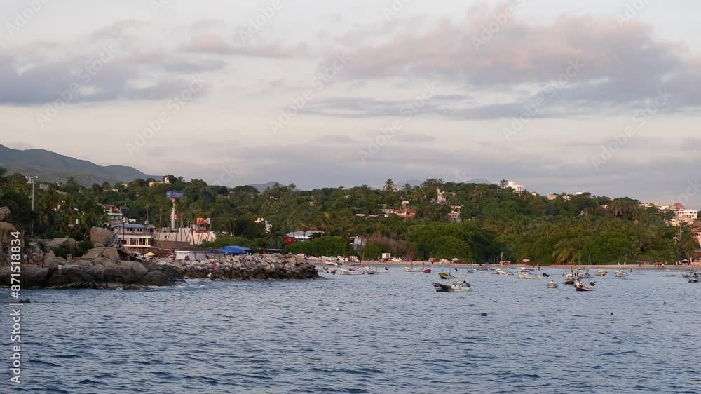 Puerto Escondido ocean waterfront boats moored during golden hour Puerto Escondido ocean waterfront boats moored during golden hour