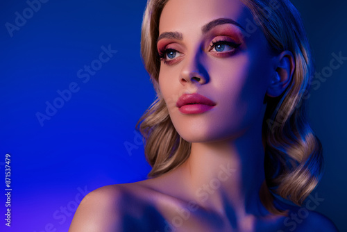Wallpaper Mural Photo of attractive girl with blonde hair curls look advertising isolated blue neon color background Torontodigital.ca