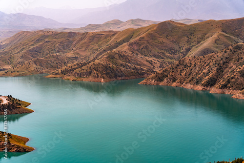 A beautiful lake with mountains in the background photo