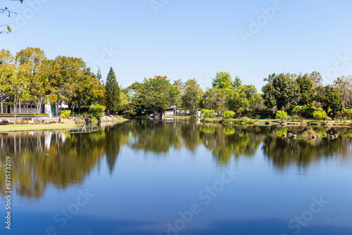 Public park with beautiful reflection on the lake in northern Thailand, summer outdoor day light