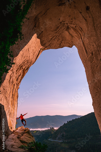 Aitzulo eye cave that opens to the Basque Country landscape