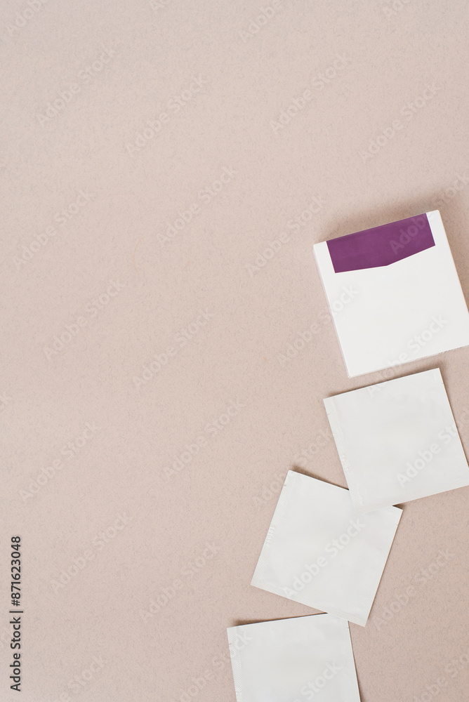 Disposable bags of cosmetics lie on a beige background with copy space Disposable bags of cosmetics lie on a beige background with copy space