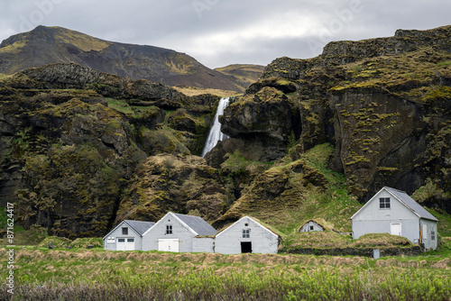 Hamragarðar campsite near the Gljúfrabúi (in the background) and Seljalandsfoss waterfall in south iceland in summer