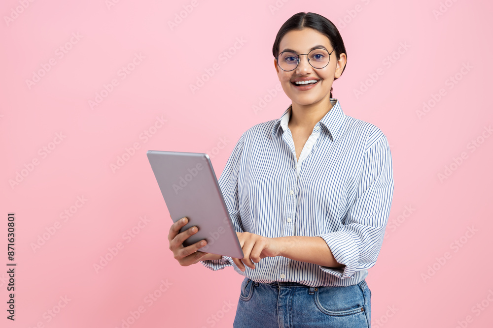 Attractive happy happy woman using digital tablet for internet browsing Attractive happy happy woman using digital tablet for internet browsing
