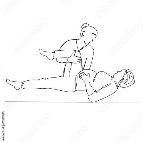 osteopath working with a pregnant woman