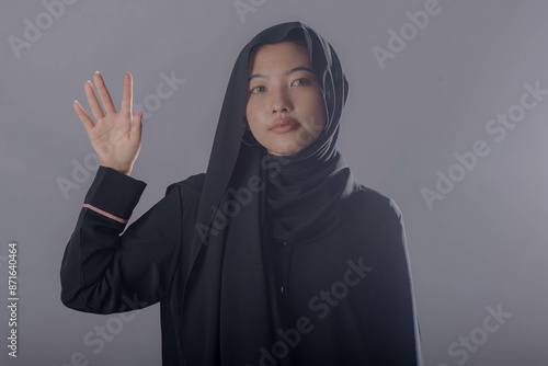 Asian Hijab Woman Wearing Black Dress