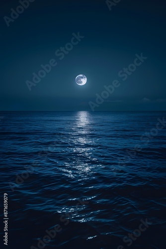 A serene moonlit night over the calm waters of an ocean, with reflections of the full moon on gentle waves.