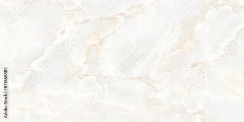 milky white marble that exudes a serene and ethereal quality. Subtle, translucent veins of light beige and cream weave through the stone