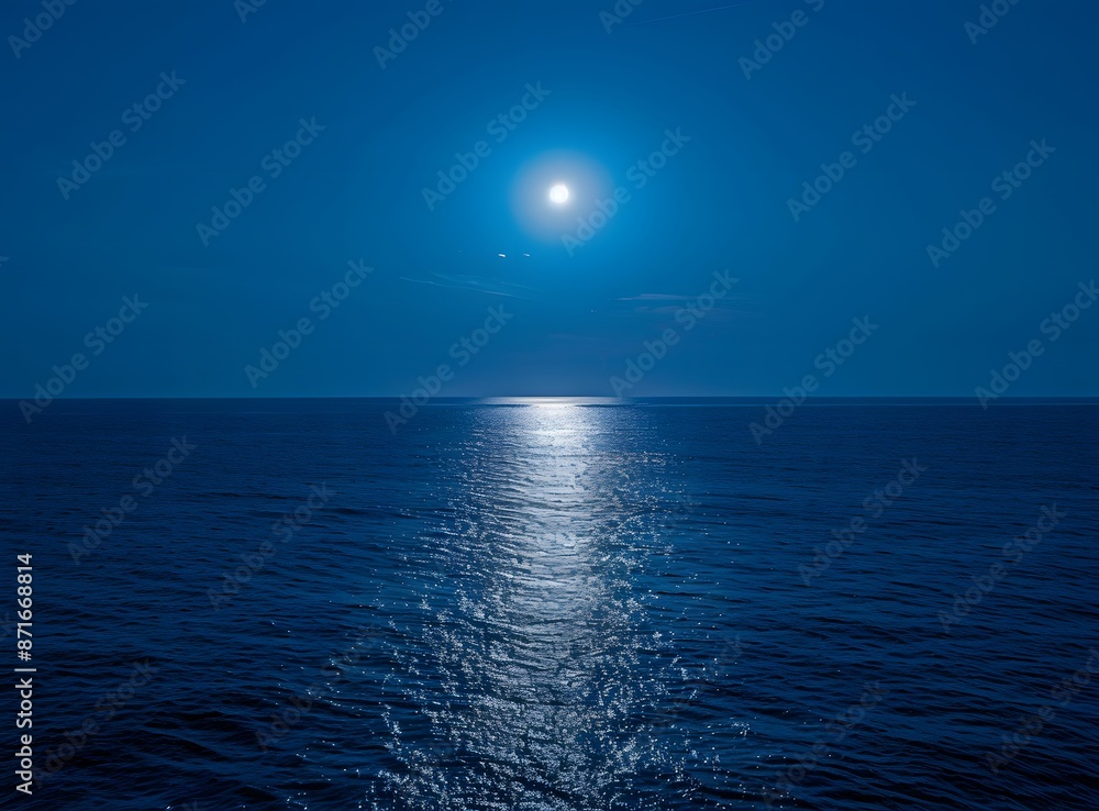 A serene moonlit night over the calm waters of an ocean, with reflections of the full moon on gentle waves. A serene moonlit night over the calm waters of an ocean, with reflections of the full moon on gentle waves.