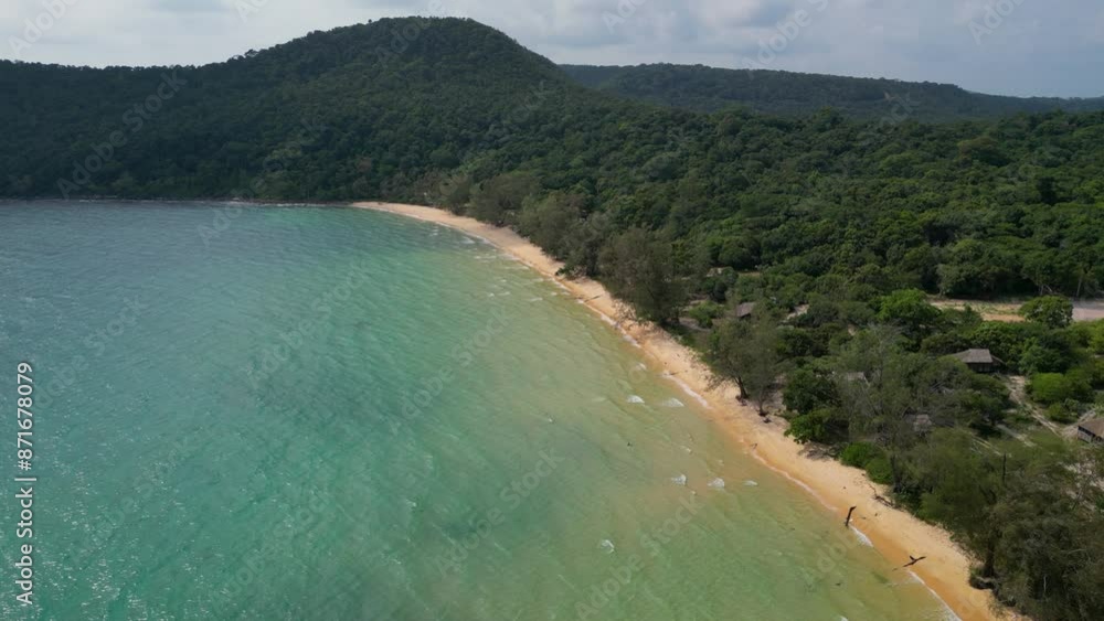 Drone shot over the coast of Koh Rong Sanloem island. Lazy Beach. Paradise island in Cambodia. Sunny day. Turquoise water. Drone shot over the coast of Koh Rong Sanloem island. Lazy Beach. Paradise island in Cambodia. Sunny day. Turquoise water.