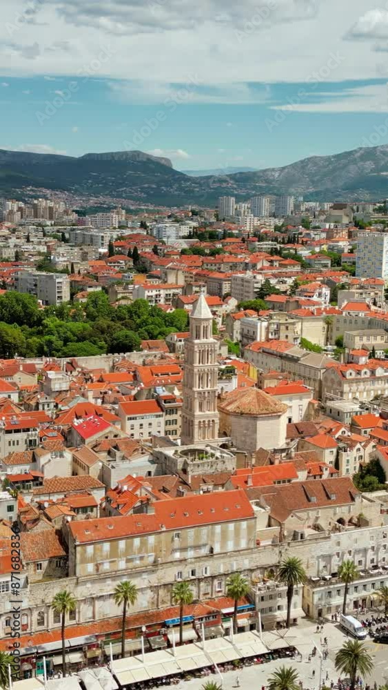 Aerial, drone view of buildings on the shore of the Adriatic sea in Dubrovnik, Croatia. Vertical Aerial, drone view of buildings on the shore of the Adriatic sea in Dubrovnik, Croatia. Vertical