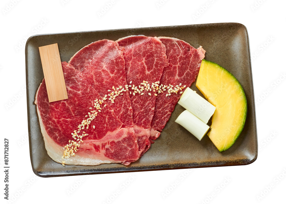 Φωτογραφία Sliced raw beef with vegetable (Pumpkin and Japanese leek) and blank name tag for food name on plate isolated on a white background