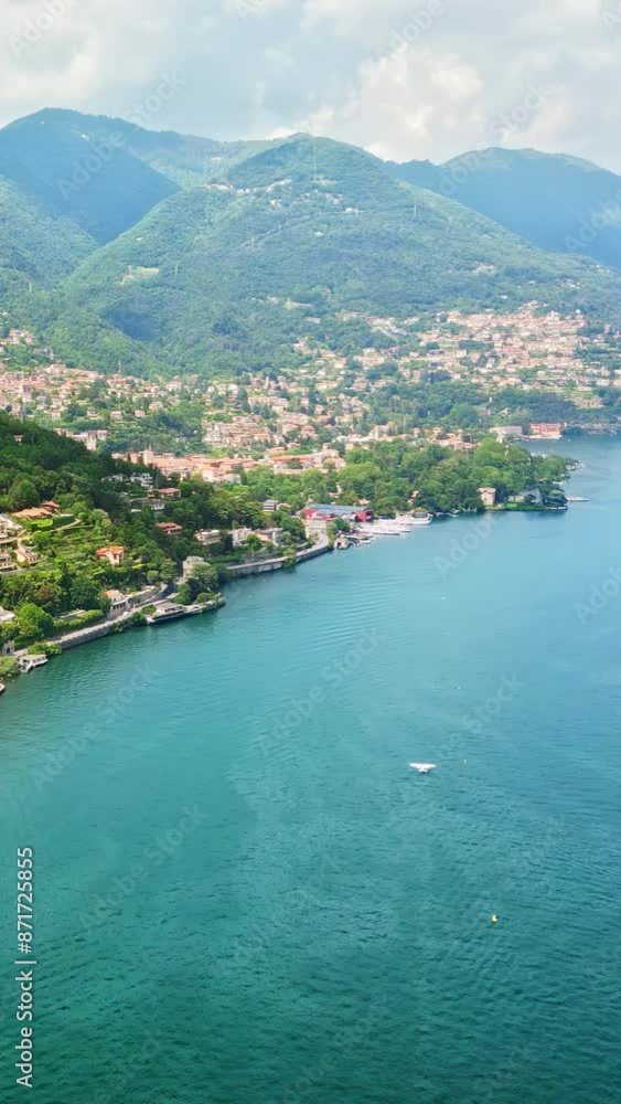 Aerial, drone view of Como, Italy on the shore of Lake Como. Vertical Aerial, drone view of Como, Italy on the shore of Lake Como. Vertical