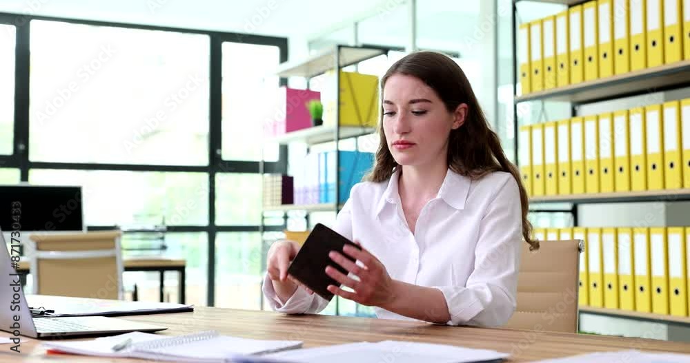 Woman shaking pennies out of purse and upset falling head on table 4k movie. Economic crisis concept Woman shaking pennies out of purse and upset falling head on table 4k movie. Economic crisis concept