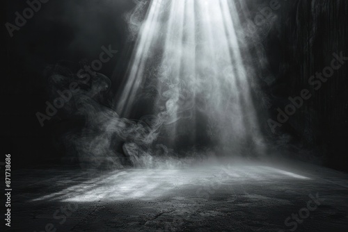 A dark room with a light shining on a cloud of smoke