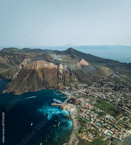 Aerial view of Vulcano Port on Vulcano island with sulfur water along the coast with boats, Aeolian Islands archipelagos, Sicily, Italy. photo