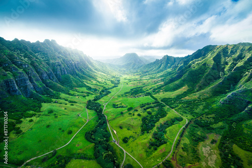 Aerial view of lush tropical valley with majestic mountains and serene forest, Kaaawa Valley, Oahu Island, United States. photo