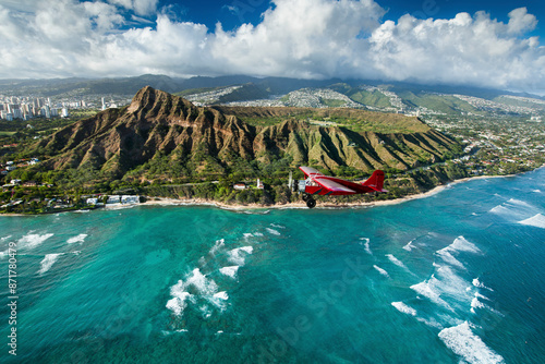 Aerial view of tropical beach with Bellanca airplane and waves, Kauai, Hawaii, United States. photo