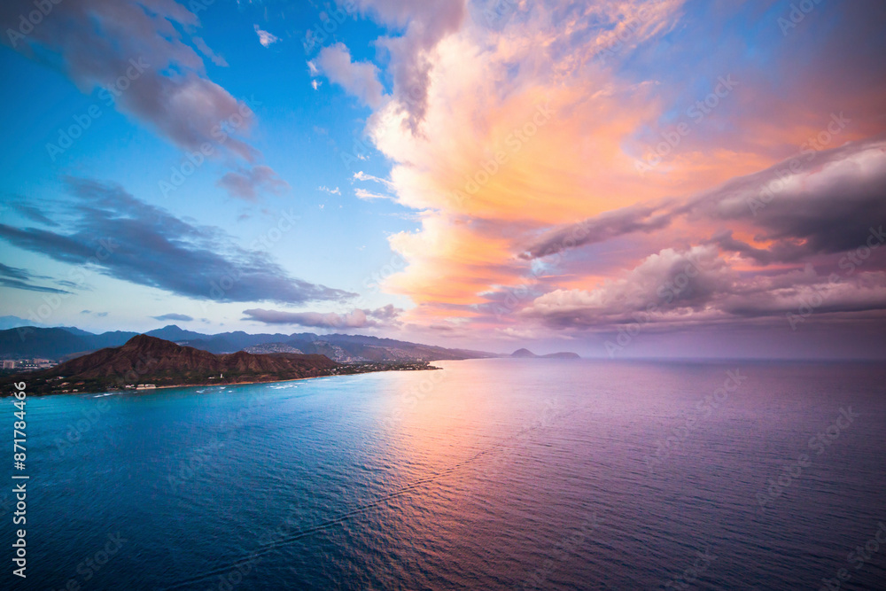 Aerial view of serene tropical coast at dusk, Hawaii, United States. Aerial view of serene tropical coast at dusk, Hawaii, United States.