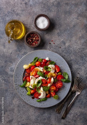 Obraz na płótnie healthy colorful tomato mozzarella basil salad with balsamic vinegar dressing w salonie