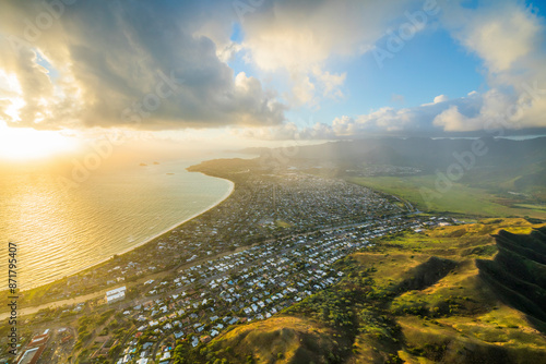 Aerial view of majestic Kalaheo Sunrise over ocean, coast, mountains, and town, Oahu, Hawaii, United States. photo