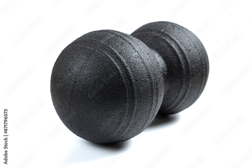 angle view big black peanut-shaped massage balls on white angle view big black peanut-shaped massage balls on white
