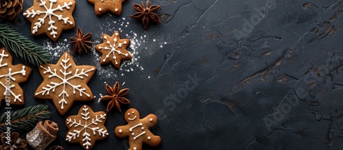 Panel kuchenny z motywem Top view of Christmas gingerbread cookies and decorations on a dark slate background with copy space image.