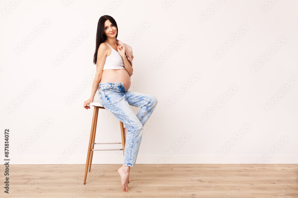 Full body portrait of a beautiful pregnant woman. Full body portrait of a beautiful pregnant woman.