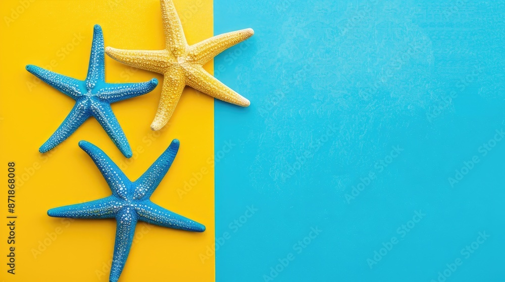 Sea stars on paper card against blue and yellow background Summer holiday theme Sea stars on paper card against blue and yellow background Summer holiday theme