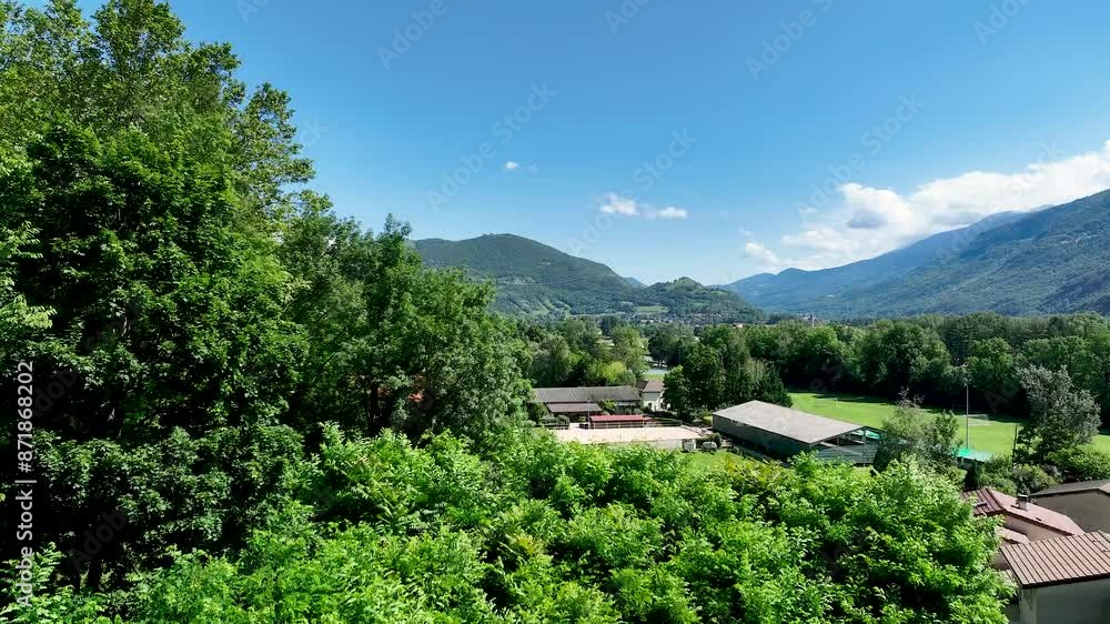 Equestrian center in nature near Vizille in the French Alps in aerial view Equestrian center in nature near Vizille in the French Alps in aerial view