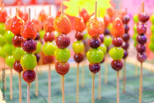 Beautifully arranged sugar-coated grape and strawberry. Tang Hu Lu