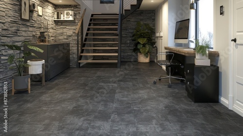 Matte charcoal grey rubber tiles in a basement, creating a sophisticated foundation for a home office