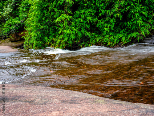 Chet Si Waterfall in the rainforest, Bueng Kan Province, Thailand photo