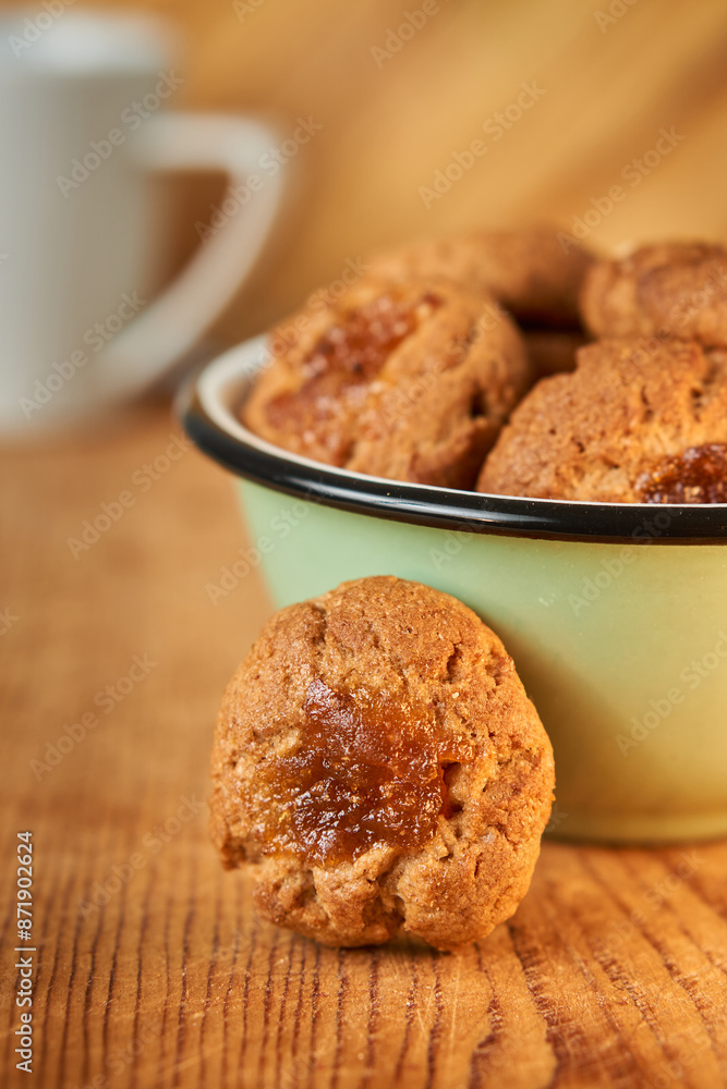 A bowl with pepas cookies on a table A bowl with pepas cookies on a table