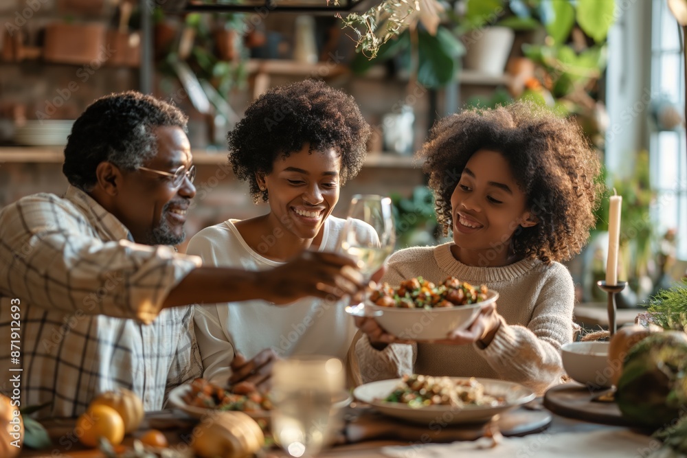 Young woman smiling while holding a plate of fresh greens at a family gathering. Young woman smiling while holding a plate of fresh greens at a family gathering.