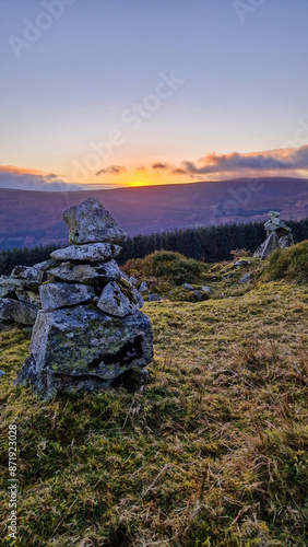 Harmony sculpted in stone at Glencree, where Wicklow Mountains embrace art and nature. photo