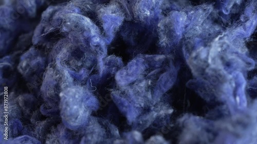 Reclaimed Denim Fiber. Denim jeans are repurposed by shredding the fabric and creating cotton fiber wadding