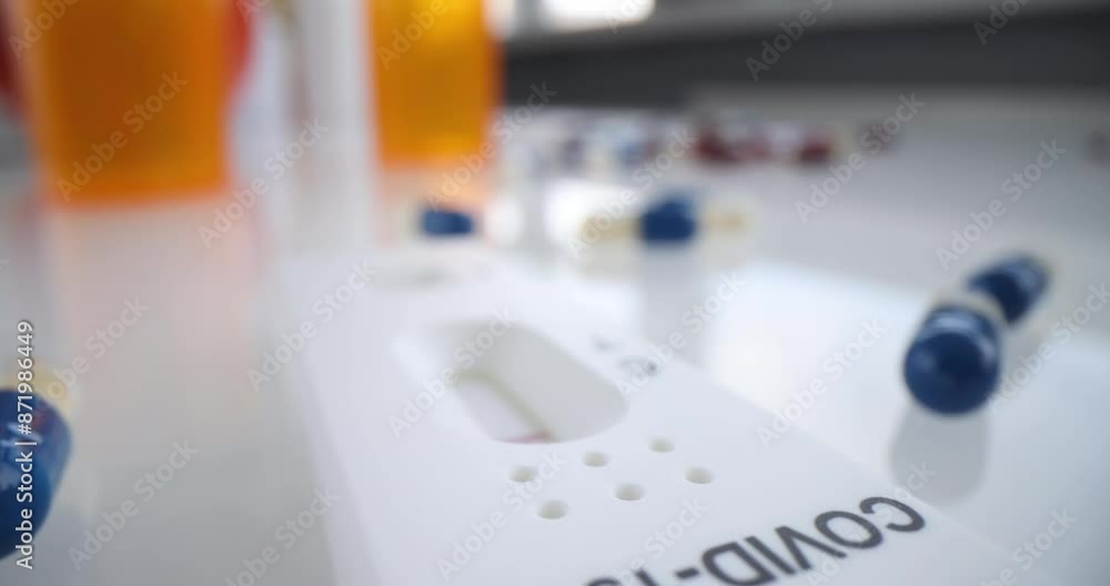 Rapid test for Covid-19 for home use and medicines in tablets. Covid-19 test kit for detecting IgM IgG antibodies and immunity in 15 minutes concept Rapid test for Covid-19 for home use and medicines in tablets. Covid-19 test kit for detecting IgM IgG antibodies and immunity in 15 minutes concept