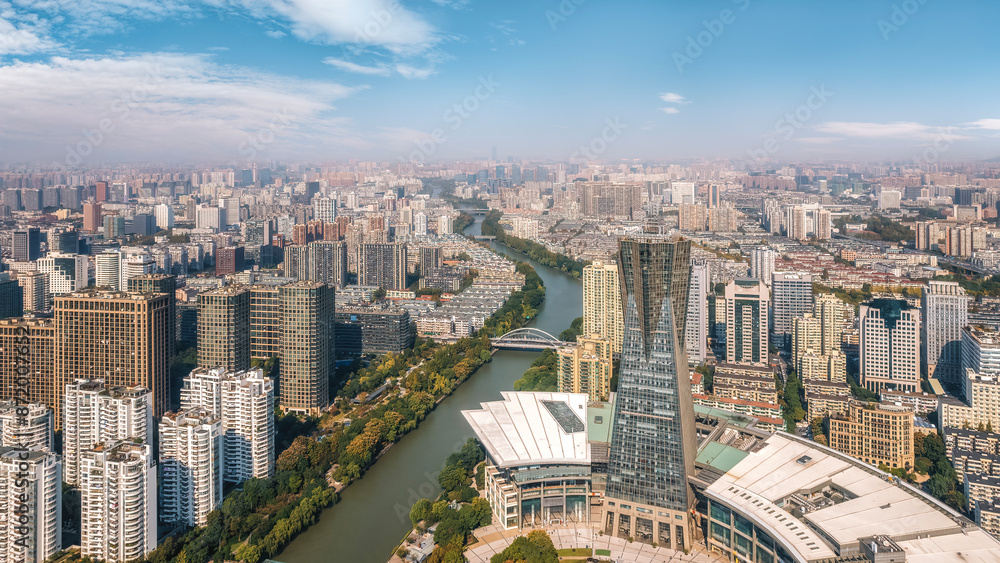Expansive Aerial View of Modern Cityscape Along River Expansive Aerial View of Modern Cityscape Along River