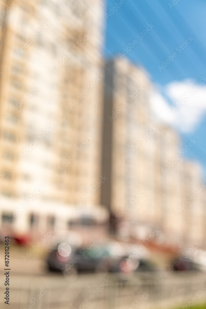 Out of focus, city streets with high-rise buildings, bokeh. Out of focus, city streets with high-rise buildings, bokeh.