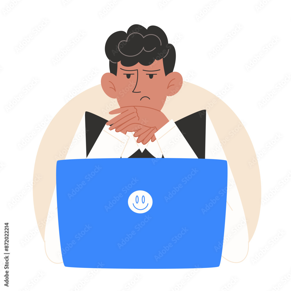 Focused schoolboy on task looking at laptop Focused schoolboy on task looking at laptop