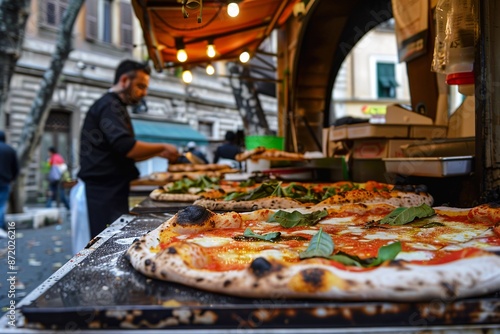 Fototapeta Naklejka Na Ścianę i Meble -  Freshly baked pizza at an italian food stand
