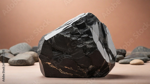 A piece of a black granite stone as a piedestal for luxury product display, branding and marketing background concept	 photo