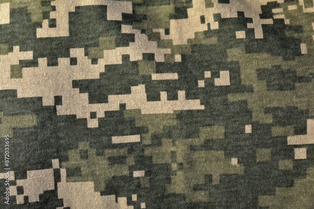 Camouflage texture, military pixel green background, close up Camouflage texture, military pixel green background, close up