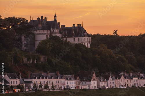 A golden sunset casts its glow on the chateau of langeais photo