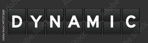 Black color analog flip board with word dynamic on gray background