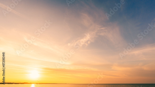 Canvas Print sunset sky in the evening with orange sunlight over the sea