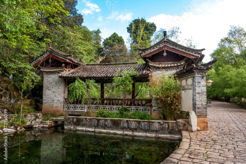 Gate and garden in Chinese style in Lijiang, Shuhe Old Town, Yunnan, China, Asia