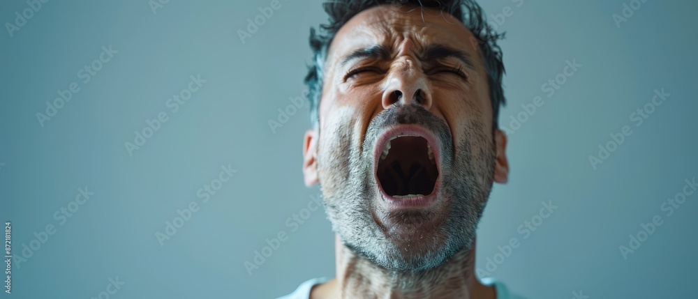 A man with an open mouth A man with an open mouth