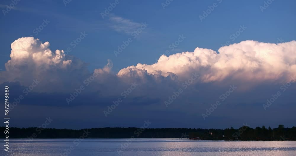 Blue clouds against the backdrop of the sunset. Natural landscape Blue clouds against the backdrop of the sunset. Natural landscape